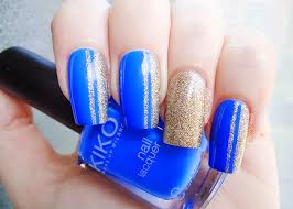 blue and gold glitter nail art