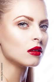 woman face red lip makeup blonde hair