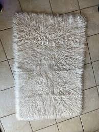 nicole miller rug white plush faux