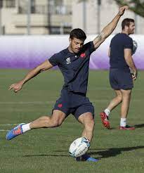 Romain ntamack will make his debut for france at the stade de france against wales on friday (photo: 2019 Rugby World Cup French Rugby Player Romain Ntamack Kicks The Ball During Training At Oita French Rugby Rugby Players Rugby