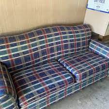sold at auction vine skirted plaid sofa
