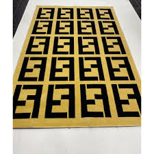 fendi carpets are golden and black