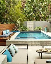The decor of this small swimming pool looks so beautiful with its earthy landscaping which includes rocks, grass field base of the backyard some greeneries, and trees. 25 Simple Small Swimming Pool Ideas For Minimalist Home Recipegood Small Pool Design Swimming Pools Backyard Small Backyard Pools