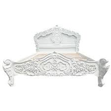 queen platform bed on tufted headboard