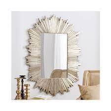 Add a few mirrors in your home to both add light and create the illusion of more space. Herzfeld Rectangular Pale Gold Wall Hanging Mirror Furniture123