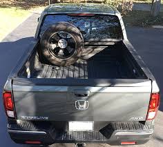 This is the most flexible utilitarian vehicle you can buy. File 2017 Honda Ridgeline Rtl E Bed With Full Size Spare 1 Jpg Wikimedia Commons