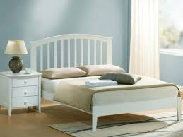 white wooden bed frame