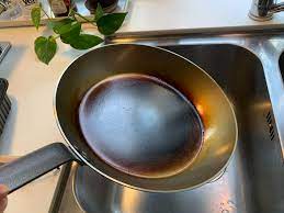 properly season a carbon steel pan