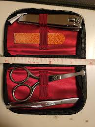nail clipper tweezer scissors in carry