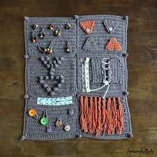 This fidget blanket will help you easy and fun to develop your child's imagination and ability to think strategically, motor skills and tactile sensations. Crochet Along Fidget Sensory Blanket For Alzheimer S Crochet Patterns Crochet Afghan Patterns Free Afghan Crochet Patterns