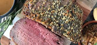 For an anniversary, birthday, or holiday dinner party, you can't beat the rosy, juicy meat and tasty au jus. Prime Rib With Rosemary Garlic Butter Rub