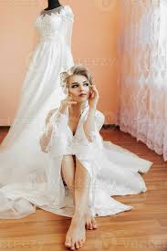a blonde bride in a long lace petticoat