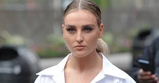 Perrie edwards' fans think she's gone into labour after boyfriend misses match. Pregnant Perrie Edwards Shows Off Her Growing Belly In Bikini Selfie News Logics