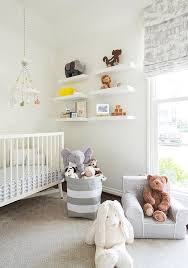 White Nursery Crib With Gray Chevron