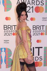 We did not find results for: Dua Lipa Looks Like Royalty In Yellow Vivienne Westwood At The 2021 Brits