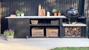 diy fans make black outdoor kitchen for