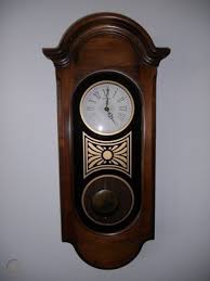 howard miller pendulum westminster wood