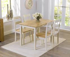 Oak dining tables have a beautiful natural grain, which is either red or white. Chiltern 114cm Oak And Cream Dining Table And Chairs The Great Furniture Trading Company