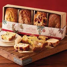 Including favourites like banana bread, carrot cake, lemon loaf and pumpkin loaf with cream cheese icing. Holiday Loaf Cakes Bakery Gifts Harry David Bakery Packaging Dessert Packaging Baking Packaging