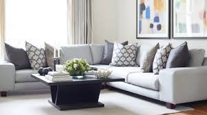 combine cushions on dark grey sofas