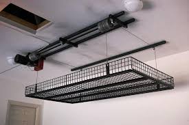 We believe you can finish it in less than a week. Image Result For Diy Garage Hoist System Garage Ceiling Storage Garage Storage Systems Overhead Garage Storage