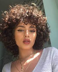 Short hair is so playful that there are a bunch of cool ways you can style it. Short Curly Hairstyles For Women