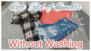 how to remove smells on clothes without