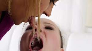 LESBIAN SPIT AND SWALLOW 
