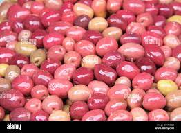 Red pickled olives on a traditional Moroccan market (souk), Rabat, Morocco  Stock Photo - Alamy