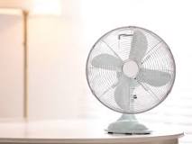 What is the best way to cool a room with a fan?