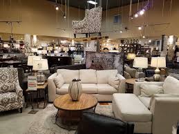 Found out they are 2 different franchises. Ashley Homestore 15424 Farm To Market Rd 1825 Suite 1 Pflugerville Tx 78660 Usa