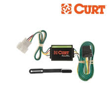 Round 1 1/4 diameter metal connector allows 1 or 2 additional wiring and lighting functions such as back up lights, auxiliary 12v power or electric brakes. Curt T Connector Trailer Wiring