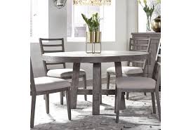 This reclaimed pine wood tabletop is about 2 1/2 inches thick, ensuring it will last for many years. Liberty Furniture Modern Farmhouse 406 Dr Ros Contemporary Round Dining Table With 12 Removable Leaf Furniture And Appliancemart Kitchen Tables