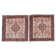 pair of little square indian carpets