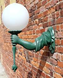 statue of liberty arm wall sconce light