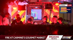 fire at carmine s gourmet market in the