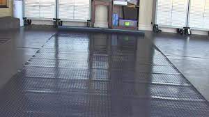 garage floor mat and it won t lay flat