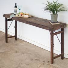 Solid/composite wood with dark espresso finish looks appealing in any commercial setting. Rustic Tables Aged Wood Folding Table