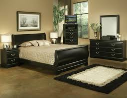 bedrooms with black furniture