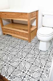 laying floor tiles in a small bathroom