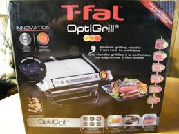 The optigrill features a powerful 1800 watt heating element, user friendly controls ergonomically located on the handle, and die cast aluminum plates with. T Fal Optigrill Gc704 In Box Navy Blue With Ceramic Coated Plates For Sale Online