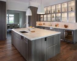 I like how a little brown shows through but not the gold/orange tone. The Psychology Of Why Gray Kitchen Cabinets Are So Popular Home Remodeling Contractors Sebring Design Build