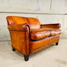 tan 2 seater leather sofa 833