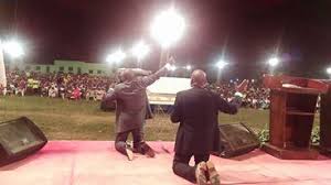 Image result for pictures of a Nigerian pastor praying