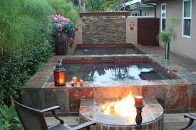 This hot tub will set you back about $1,000 to build, but you aren't building just the hot tub itself. Backyard With Double Hot Tub Design Hot Tub Outdoor Hot Tub Landscaping Fire Pit Backyard