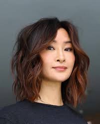 ideal haircuts for women with thick hair