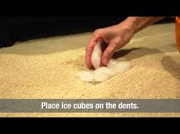 how to fix furniture dents in carpet