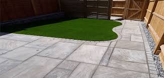 Sandstone Patio With Artificial Grass