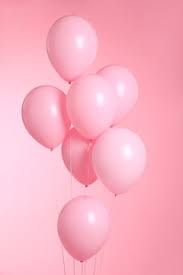 closeup of balloons isolated on pink