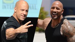 He is tall (183 cm), he weights 102 kg and there's no fat in his body. Vin Diesel Dwayne The Rock Johnson Box Office Muscle Variety
